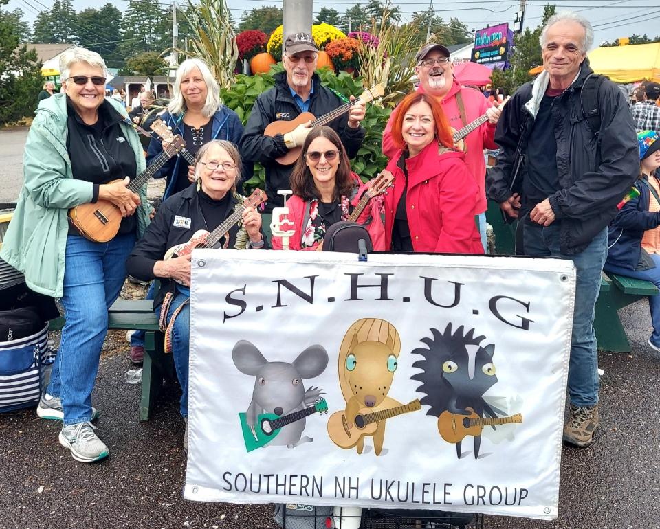The Southern NH Ukulele Group performed to enthusiastic fairgoers despite the rainy weather on Friday, Sept. 29. Pictured from left to right are Janet Mayo, Kim Martin, Tom Duffy, Keith MacFadgen, Steve Meyers. Front row are Peggy Tucker, Kathy Bilodeau-Olkavikas and June Pinkham