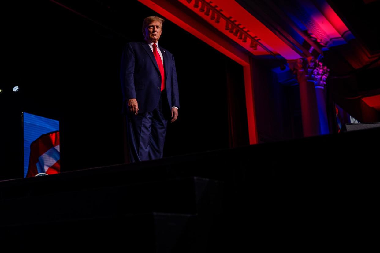 <span>Donald Trump arrives to address the National Religious Broadcasters convention in Nashville, Tennessee, on Thursday.</span><span>Photograph: Jon Cherry/Getty Images</span>