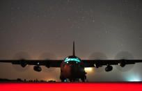 A C-130J Hercules assigned to Little Rock Air Force Base, Arkansas, performs an engine-running offload at Geronimo Landing Zone on Fort Polk, Louisiana (Tech. Sgt. Parker Gyokeres/USAF/Rex Features)