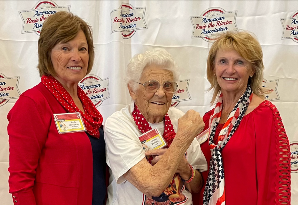 Louise Unkrich and her daughters, Trish Woepking (left) and Julia Unkrich (right), at the 2022 Rosie the Riveter Convention in New Orleans, Louisiana.