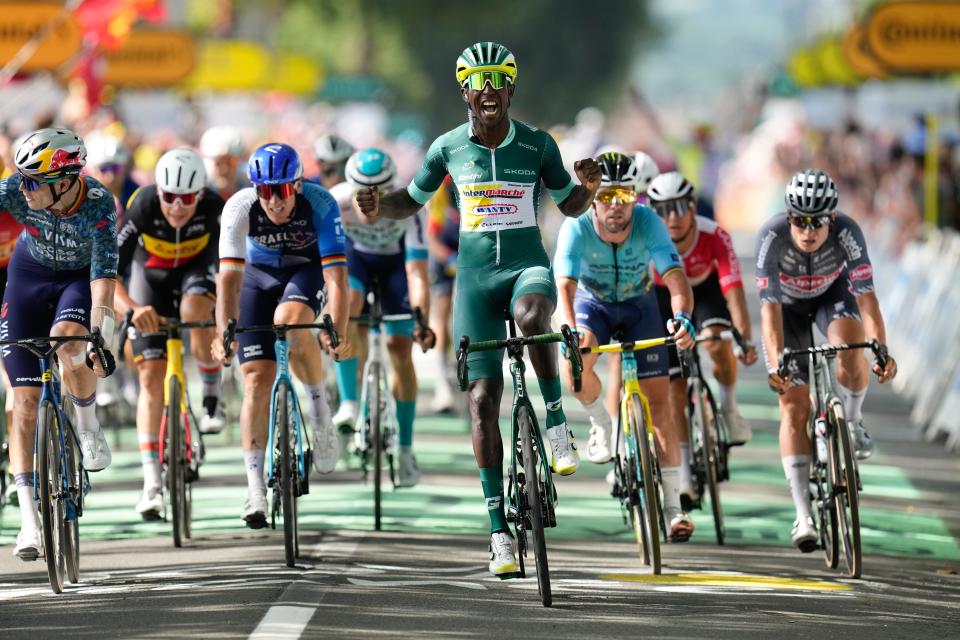 Biniam Girmay celebrates his third win of the Tour de France on stage 12 (AP)