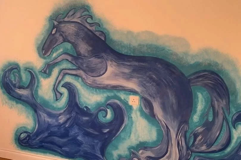 Horse mural on wall