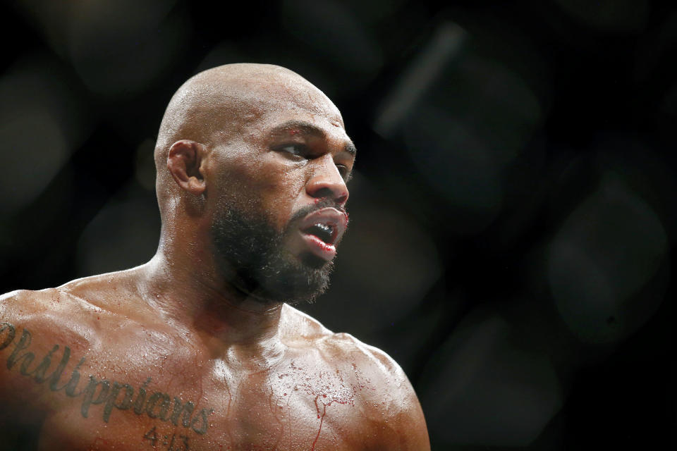 Feb 8, 2020; Houston, Texas, USA; Jon Jones (red gloves) fights Dominick Reyes (not pictured) during UFC 247 at Toyota Center. Mandatory Credit: Thomas Shea-USA TODAY Sports