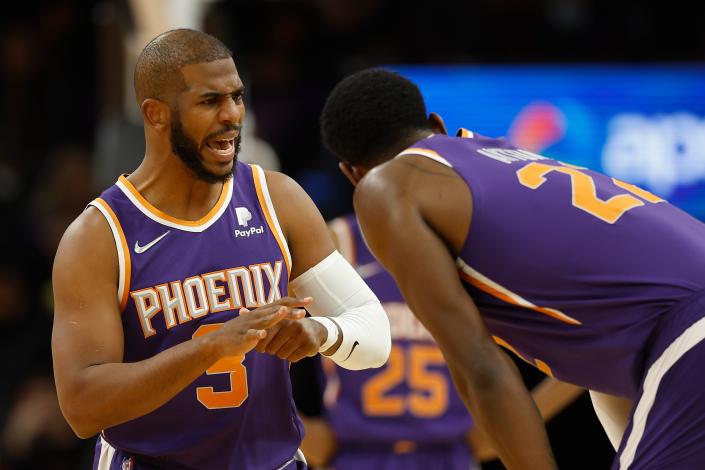 Chris Paul #3 of the Phoenix Suns reacts after an injury to his hand and a technical-foul during the second half of the NBA game against the Houston Rockets at Footprint Center on February 16, 2022 in Phoenix, Arizona. The Suns defeated the Rockets 124-121.
