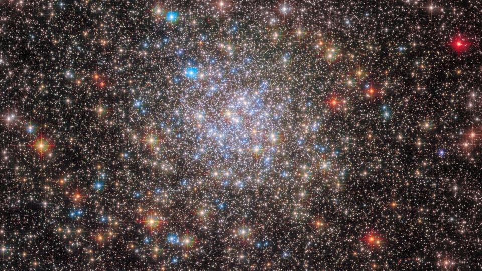 The globular cluster NGC 6355, located in the inner Milky Way, is densely packed with tens of thousands to millions of stars.