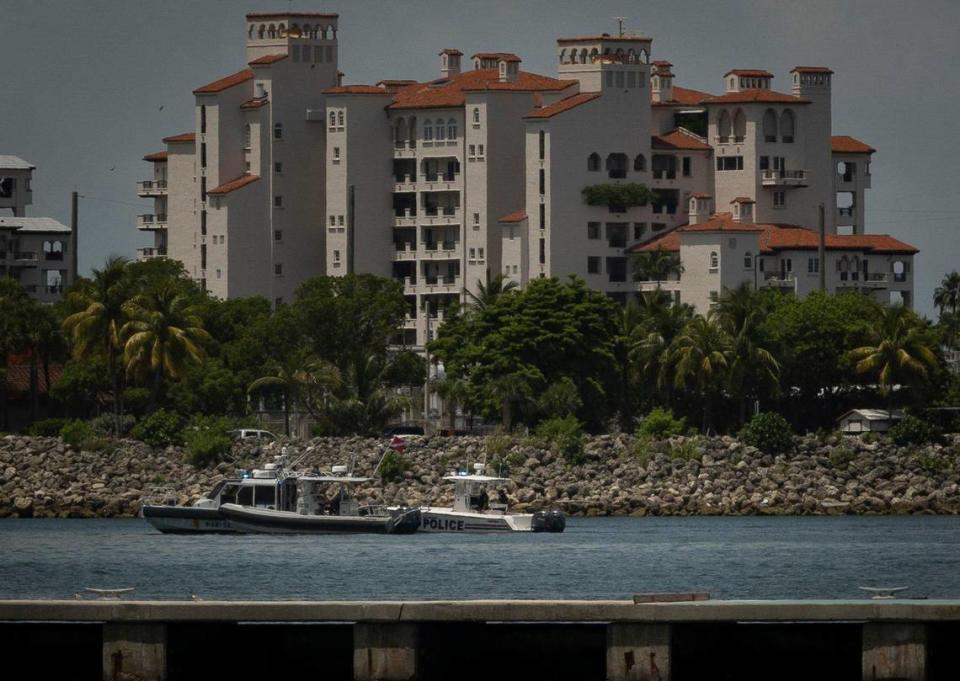 The police investigate the scene around where a boat crashed into the Fisher Island ferry earlier this morning surrounding Fisher Island on Sunday, June 25, 2023, in Biscayne Bay. Boat traffic was closed off in the surrounding area.
