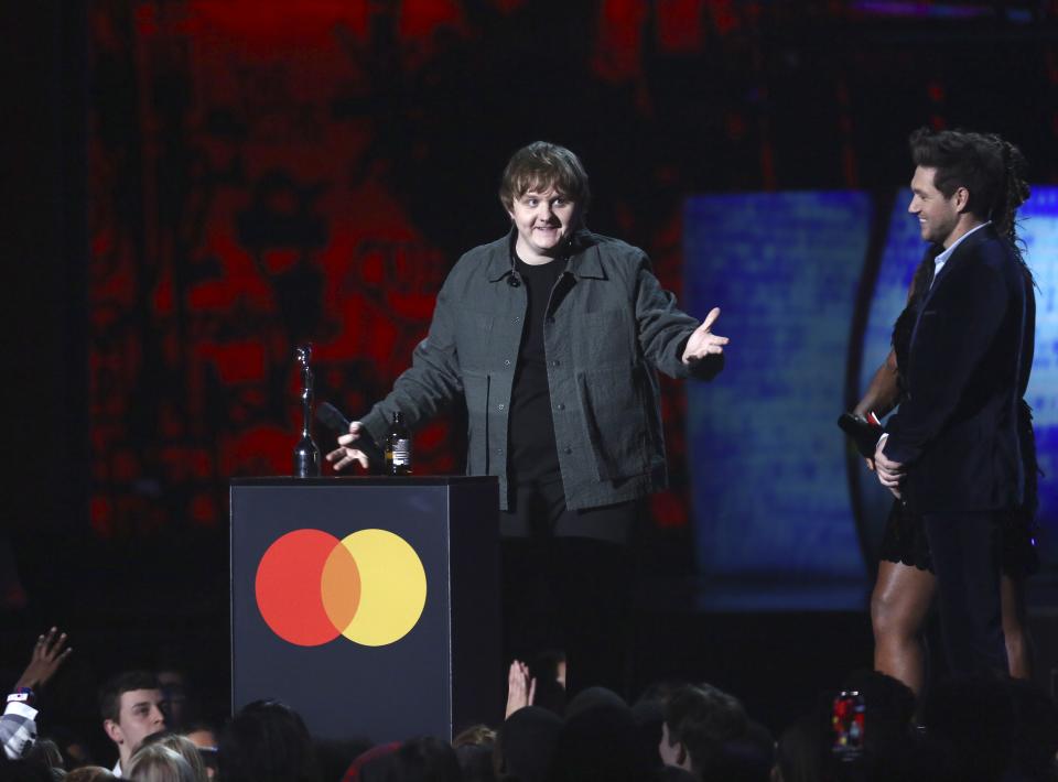 Lewis Capaldi accepts his award for New Artist of the Year on stage at the Brit Awards 2020 in London, Tuesday, Feb. 18, 2020. (Photo by Joel C Ryan/Invision/AP)