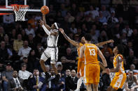 Vanderbilt guard Ezra Manjon (5) shoots against Tennessee during the second half of an NCAA college basketball game Wednesday, Feb. 8, 2023, in Nashville, Tenn. (AP Photo/Wade Payne)