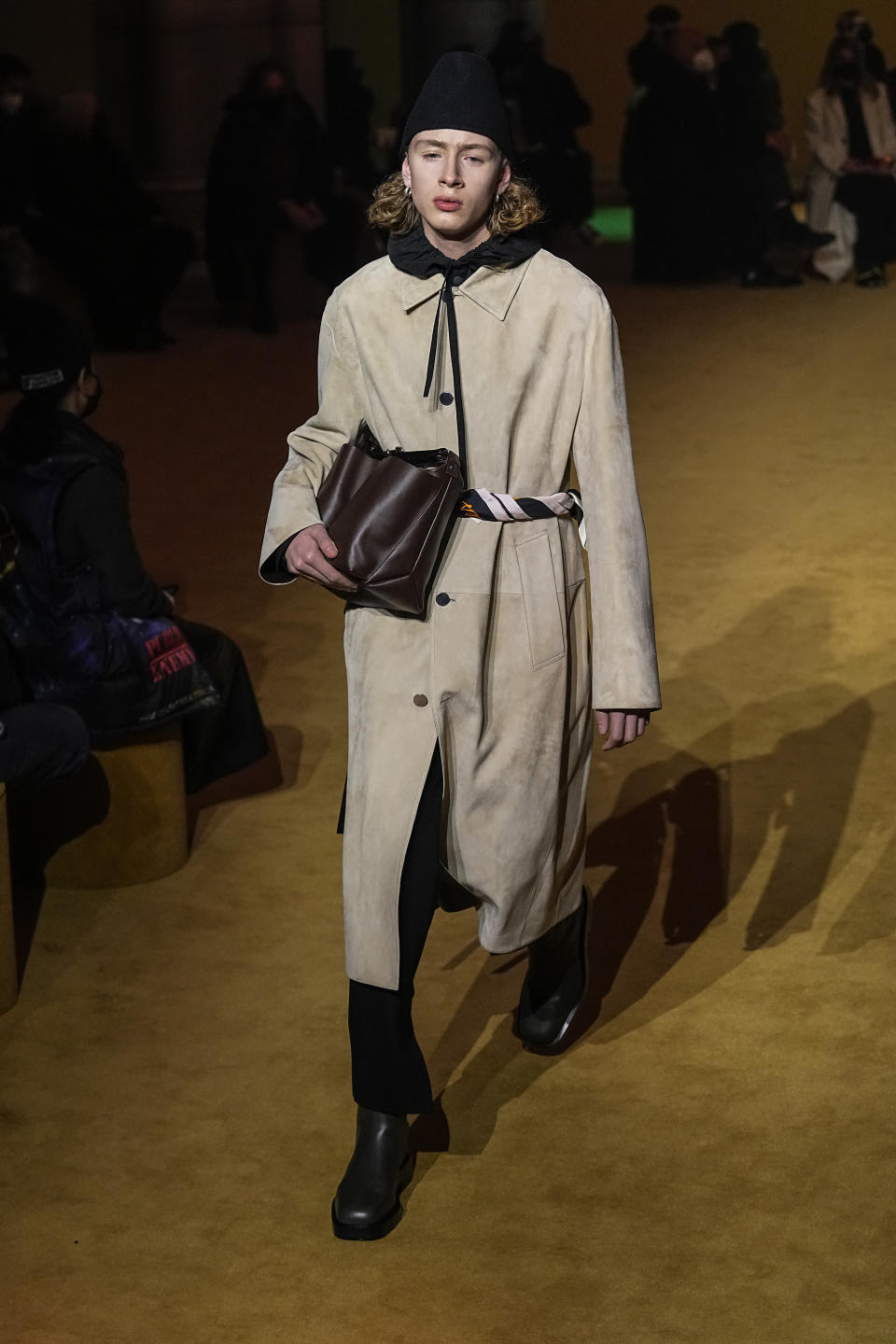 A model wears a creation for the Jil Sander fall-winter 22/23 men's collection, in Paris, Friday, Jan. 21, 2022. (AP Photo/Michel Euler)