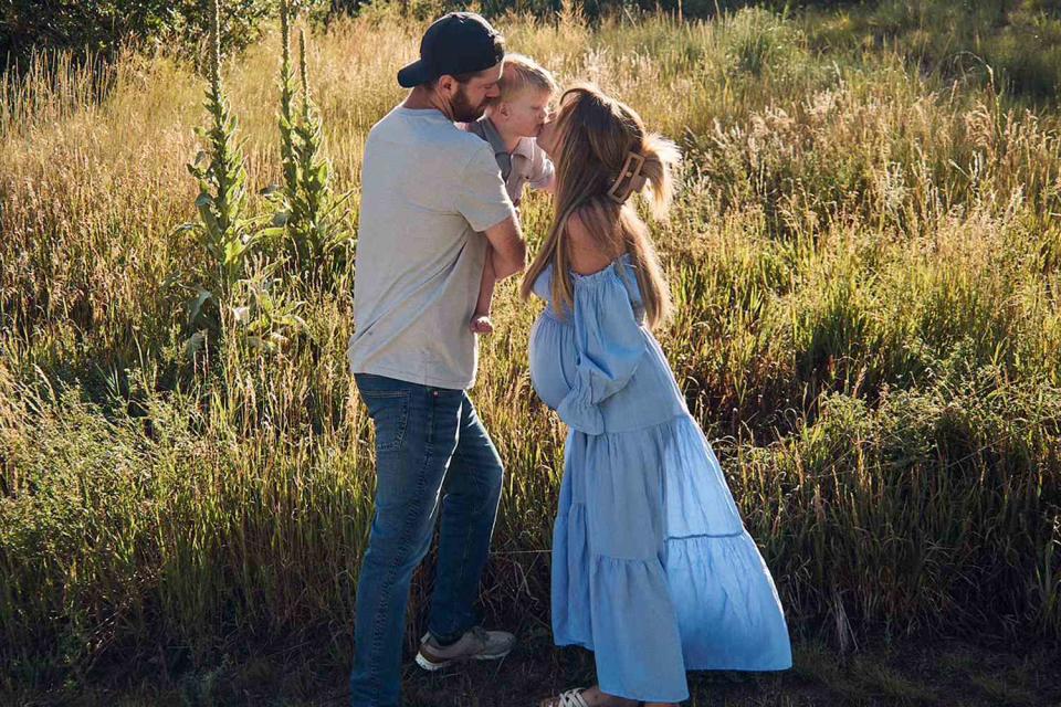 <p>Justus Stroup</p> Justus Stroup with her son and husband while pregnant with her daughter, Sutton