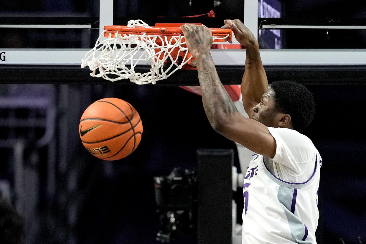 Kansas State guard Cam Carter dunks against Iowa State during Saturday's game at Bramlage Coliseum.