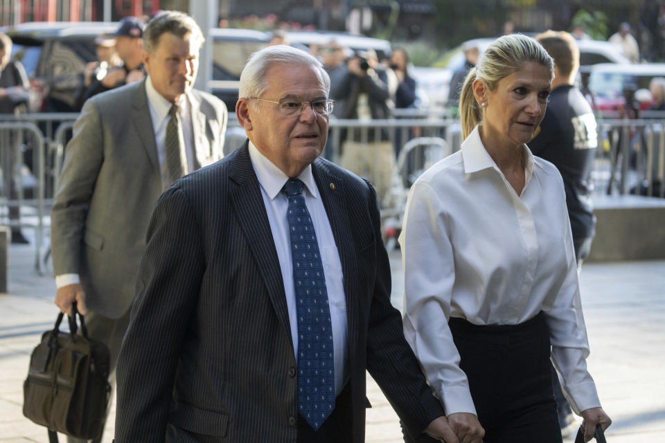 Democratic U.S. Sen. Bob Menendez of New Jersey and his wife Nadine Menendez arrive to the federal courthouse in New York, Wednesday, Sept. 27, 2023. Menendez is due in court to answer to federal charges alleging he used his powerful post to secretly advance Egyptian interests and carry out favors for local businessmen in exchange for bribes of cash and gold bars. (AP Photo/Jeenah Moon)