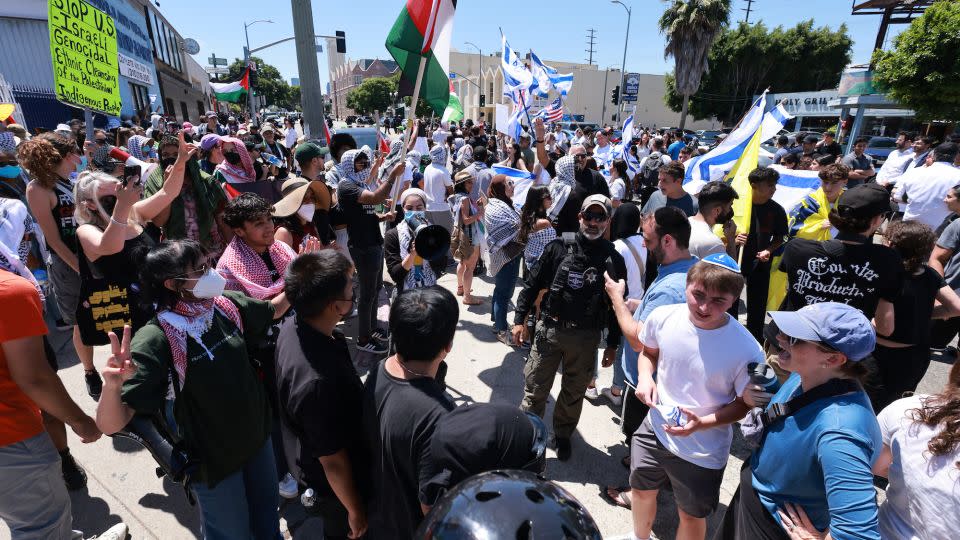 Pro-Israel supporters and pro-Palestinian protesters clashed outside of the Adas Torah Orthodox Jewish synagogue in Los Angeles on Sunday, June 23. - David Swanson/AFP/Getty Images