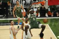 Milwaukee Bucks' Bobby Portis dunks during the first half of Game 1 of the NBA Eastern Conference basketball finals game against the Atlanta Hawks Wednesday, June 23, 2021, in Milwaukee. (AP Photo/Morry Gash)