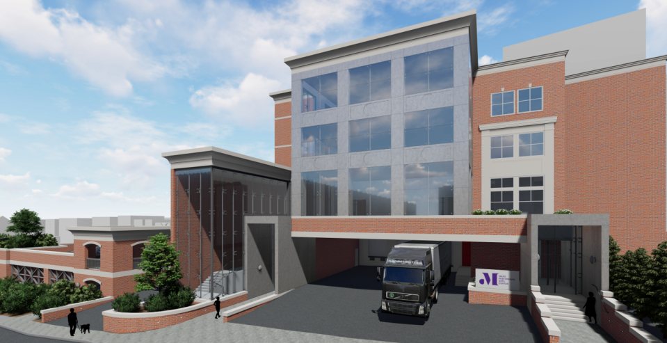 Renderings seen in the Mayo Performing Arts Center's application for a major expansion of its facilities. This view is from Pine Street, behind the existing theater, fronted by a new loading dock and a gallery entrance to new office space and arts education facilities.