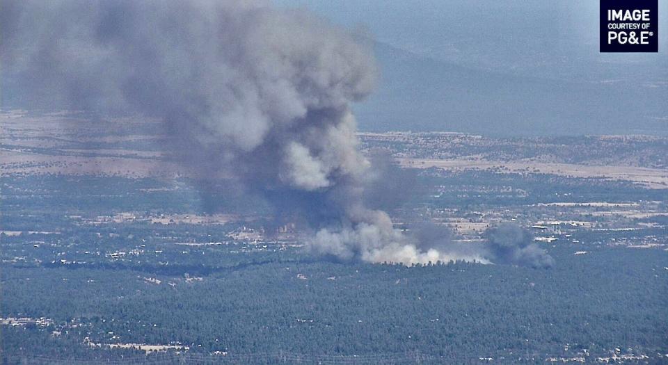 A vegetation fire is burning just west of Anderson at the end of Peter Pan Gulch Road on Thursday afternoon, July 14, 2022.