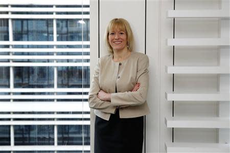 CEO Charlotte Crosswell of NASDAQ OMX NLX poses after an interview with Reuters in London March 20, 2014. REUTERS/Luke MacGregor