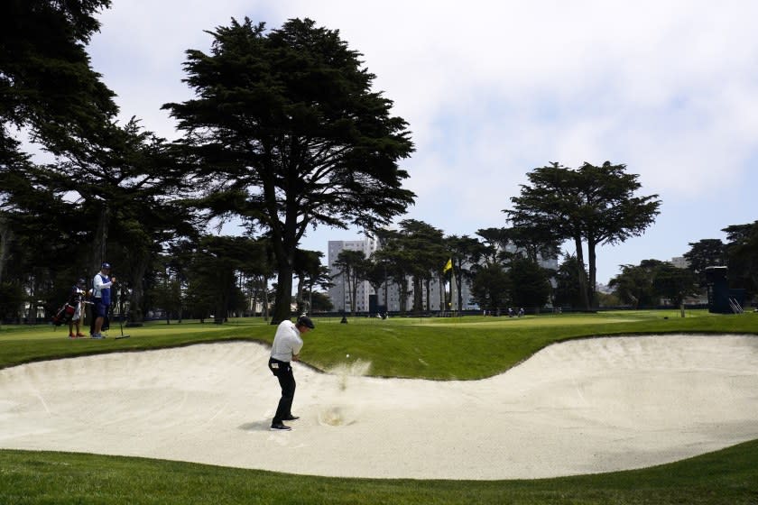 Bryson DeChambeau hits from the bunker on the second hole during the third round of the PGA Championship.