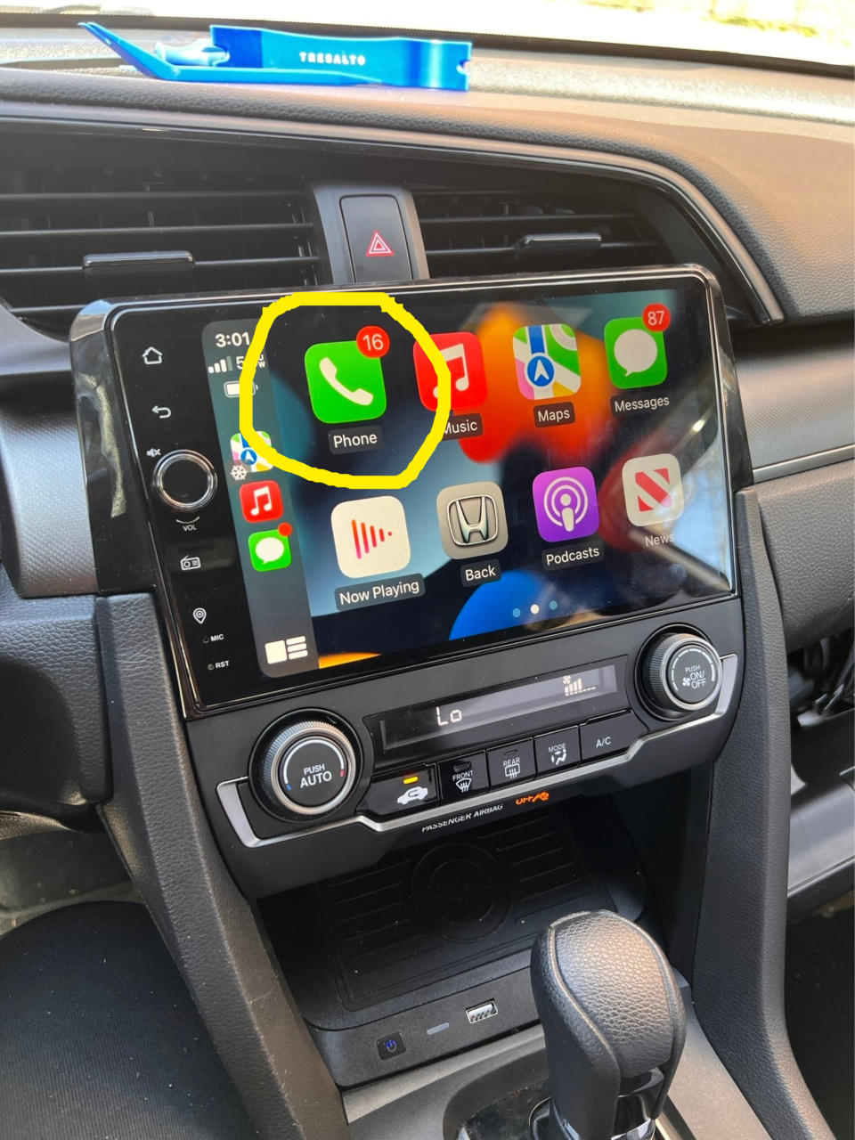 A car's carplay screen with the phone app circled