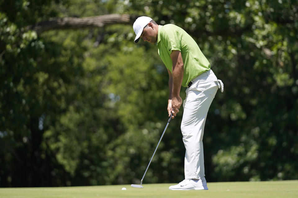 Scottie Scheffler putts on the seventh green during the first round of the Charles Schwab Challenge golf tournament at the Colonial Country Club, Thursday, May 26, 2022, in Fort Worth, Texas. (AP Photo/Tony Gutierrez)