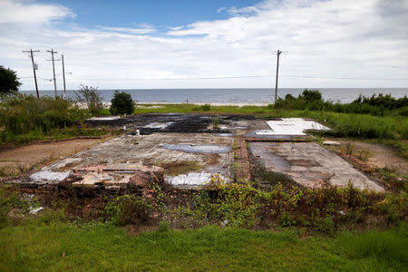 A slab where a house once stood is seen as Tropical Storm Gordon approaches Waveland, Mississippi, U.S., September 4, 2018. REUTERS/Jonathan Bachman