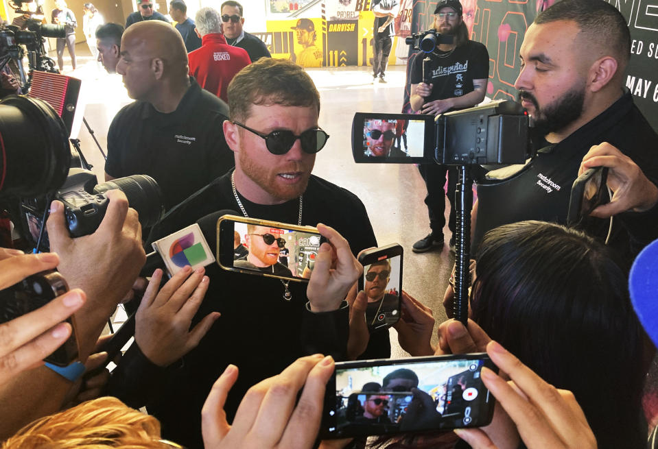 Super middleweight champion Canelo Alvarez speaks to the media before a news conference in San Diego on Thursday, March 16, 2023. Alvarez is taking a massive pay cut to fight in his native Mexico for the first time in 11 ½ years when he takes on Britain’s John Ryder on May 6. (AP Photo/Greg Beacham)