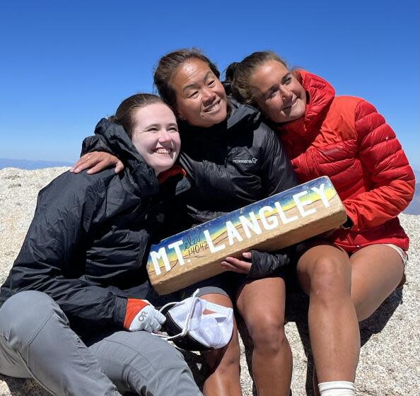 Eline Oidvin, center, at the summit of Mount Langley with guides Ellen MacNary, left, and Therese Nordbo. Oidvin, blind since birth, was making her first high mountain trek.