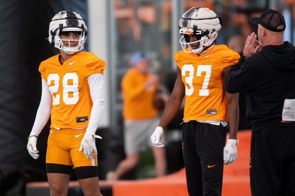 Tennessee defensive backs Kaleb Beasley (28) and Montrell Bandy (37) during UT spring football practice on Tuesday, March 19, 2024.