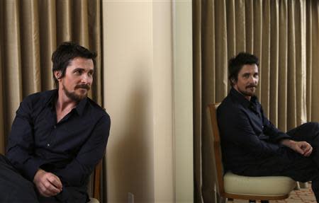 British actor Christian Bale poses for a portrait while promoting his upcoming movie "Out of the Furnace" in Los Angeles, California November 16, 2013. REUTERS/Mario Anzuoni