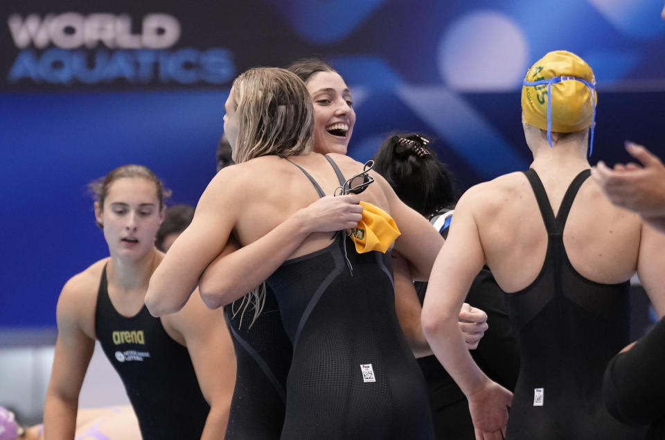 Australian team celebrates after wining Women 4 x100 meter freestyle relay finals at the World Swimming Championships in Fukuoka, Japan, Sunday, July 23, 2023. (AP Photo/Eugene Hoshiko)