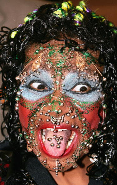 LONDON - NOVEMBER 16: Elaine Davidson the most pierced woman attends the Guinness World Records - 50th Anniversary Party at the Royal Opera House on November 16, 2004 in London. The 2005, or 50th, edition of the famous book was actually published September 10. Total sales now exceed 100 million copies, with over 550,000 sold annually in the UK and four million sold globally. (Photo by Gareth Cattermole/Getty Images)