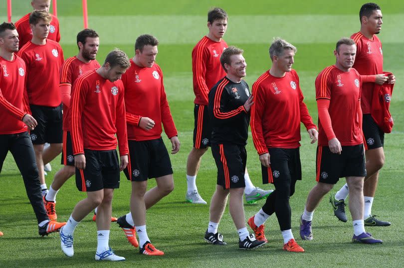 James Wilson, Phil Jones, Donald Love, Bastian Schweinsteiger, Wayne Rooney and Chris Smalling of Manchester United in action during a first team training session