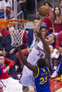 Los Angeles Clippers forward Blake Griffin (32) goes up against Golden State Warriors forward Draymond Green (23) during the first half of Game 7 of a first-round NBA basketball playoff series, Saturday, May 3, 2014, in Los Angeles. (AP Photo/Ringo H.W. Chiu)