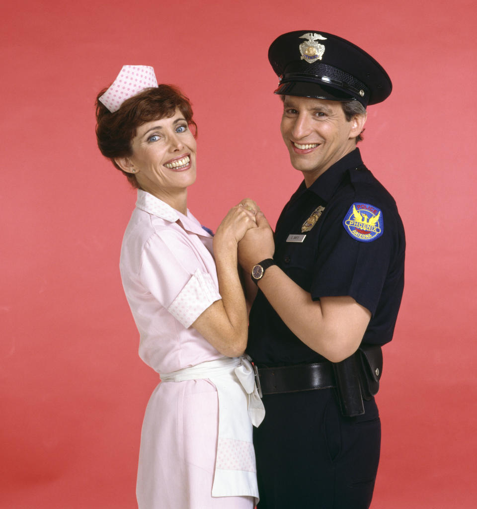 LOS ANGELES - JANUARY 1: Alice, a CBS television situation comedy, about characters who work and dine at Mel's Diner. January 1, 1983. Pictured is Beth Howland (as Vera Louise Gorman, waitress) and Charles Levin (as Elliot Novak, police officer). (Photo by CBS via Getty Images) 