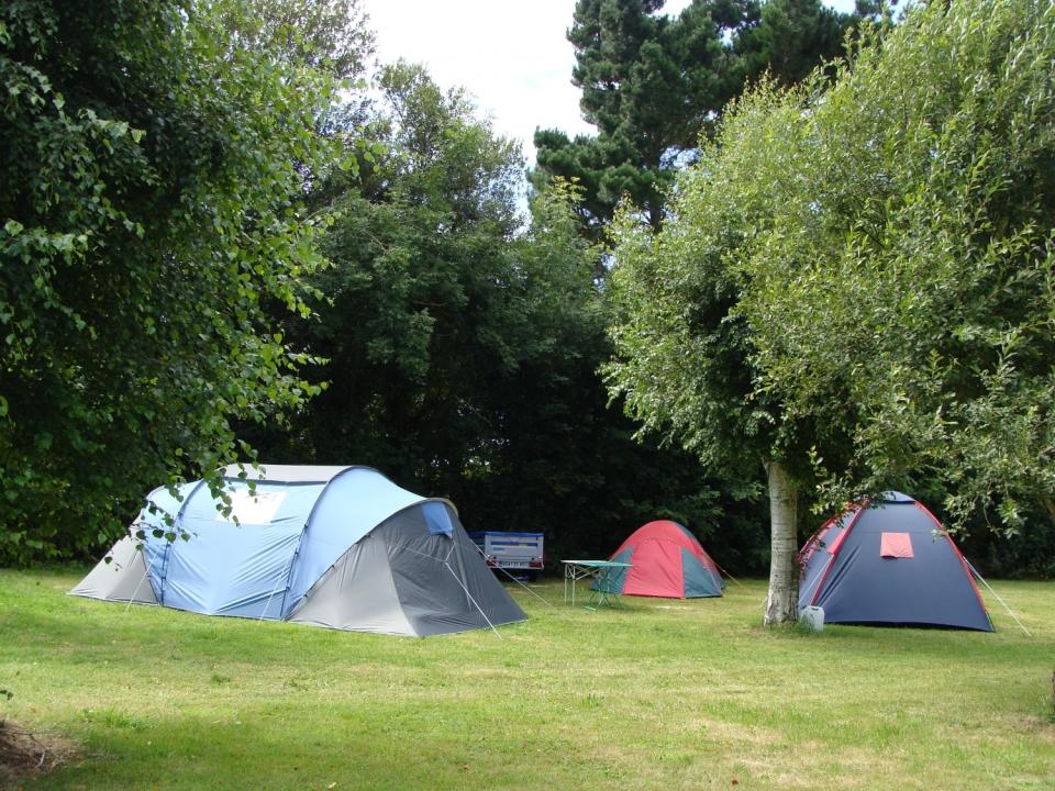 <p><span>Within cycling distance of Brittany’s best beaches, </span><a rel="nofollow noopener" href="https://coolcamping.com/campsites/europe/france/north-west-france/brittany-normandy/2479-flower-camping-les-genets" target="_blank" data-ylk="slk:Camping Les Genets;elm:context_link;itc:0;sec:content-canvas" class="link "><span>Camping Les Genets</span></a><span> offers traditional camping among the greenery with family-friendly facilities in spades. There’s a swimming pool, water slides, sports pitches, a playground and static caravans, as well as a section dedicated to traditional tent campers. A tent and two people from €14.50 (£12.30). [Photo: Cool Camping]</span> </p>