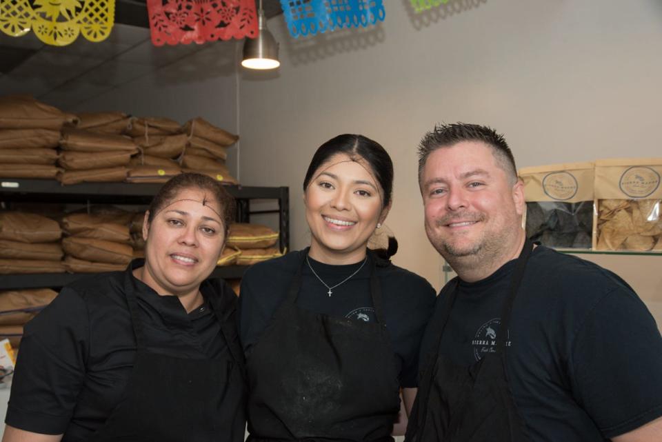 Family-run shop: Sierra Madre tortilla factory owners (from right) Mounir Monroy and Claudia Monroy are joined by Claudia's mother Claudia Dominguez, who makes the shop's Mexican dishes in Lake Worth Beach.