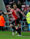 Soccer Football - Championship - Sunderland vs Middlesbrough - Stadium of Light, Sunderland, Britain - February 24, 2018 Sunderland's Callum McManaman celebrates scoring their third goal with team mates Action Images/Craig Brough