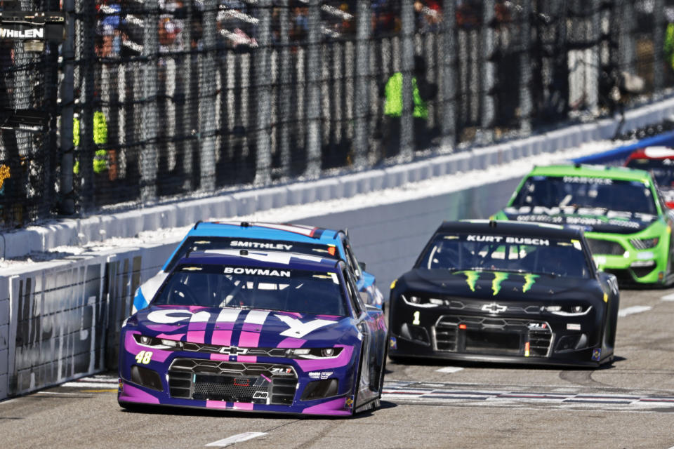 Alex Bowman (48) leads the field during a NASCAR Cup Series auto race, Sunday, Oct. 31, 2021, in Martinsville, Va. (AP Photo/Wade Payne)