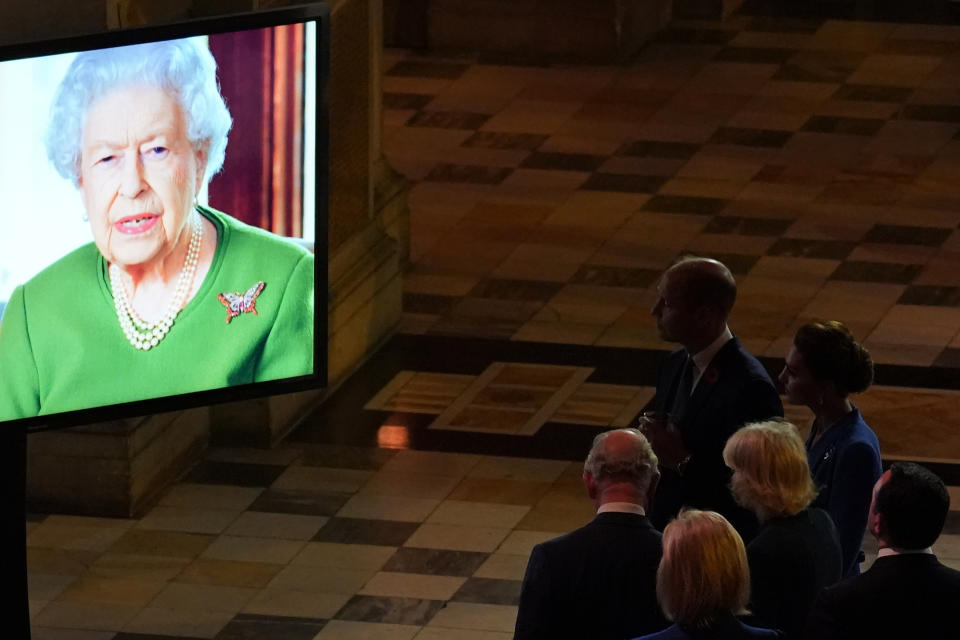 The Prince of Wales (left) and the Duchess of Cornwall (centre) with the Duke and Duchess of Cambridge watching as Queen Elizabeth II makes a video message to attendees of an evening reception for the Heads of State and Government, to mark the opening day of the Cop26 summit in Glasgow. Picture date: Monday November 1, 2021.