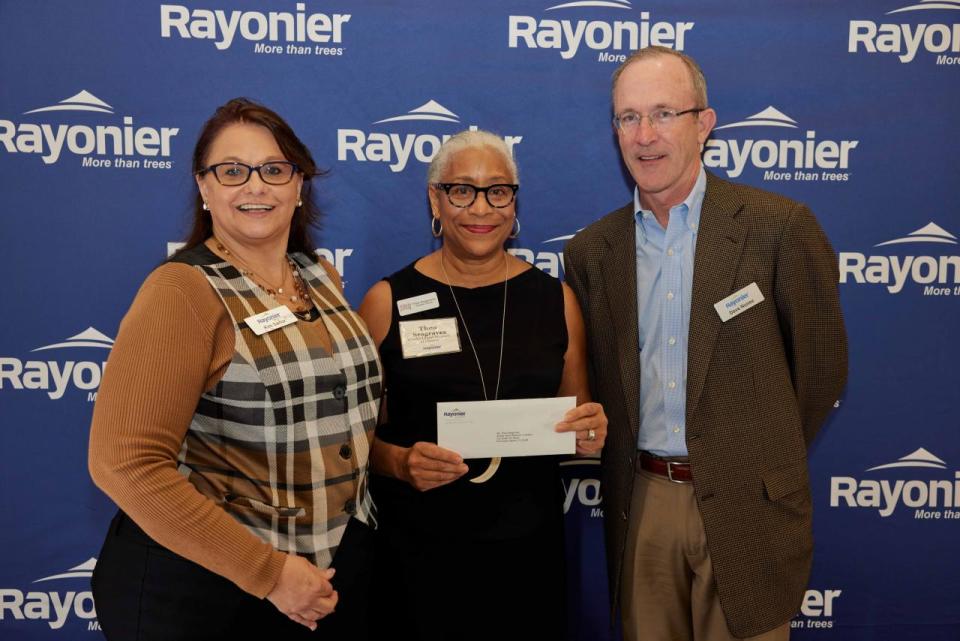 Kim Sartor, Community Affairs Manager, Rayonier; Thea Seagraves, Amelia Island Museum of History; and Dave Nunes, CEO, Rayonier.