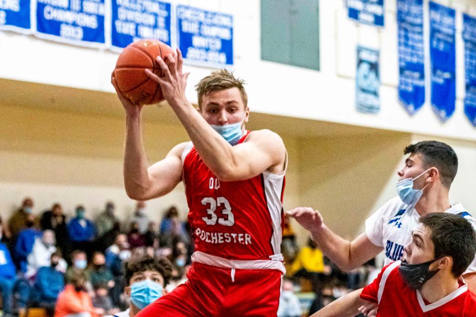 Old Rochester's Steven Morrell pulls in the defensive rebound for the Bulldogs.