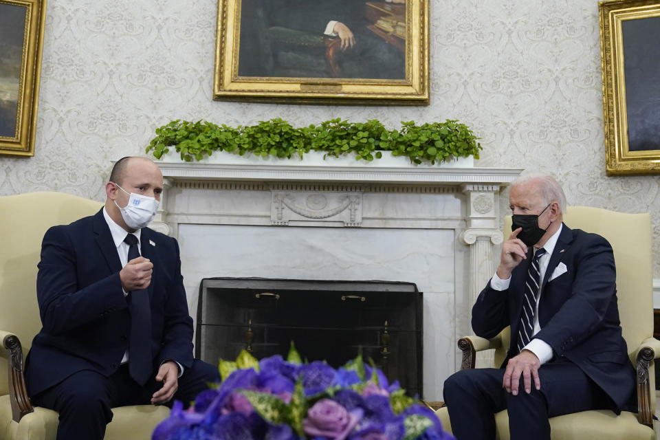 President Joe Biden meets with Israeli Prime Minister Naftali Bennett in the Oval Office of the White House, Friday, Aug. 27, 2021, in Washington. (AP Photo/Evan Vucci)