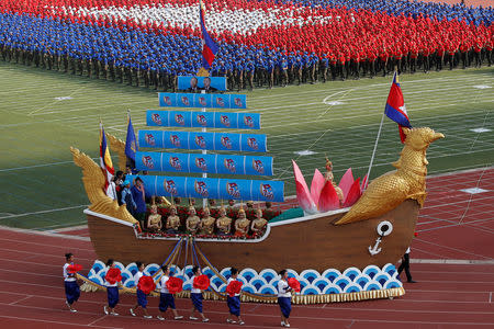 Cambodians attend an event to mark the 40th anniversary of the toppling of Pol Pot's Khmer Rouge regime at the Olympic stadium in Phnom Penh, Cambodia, January 7, 2019. REUTERS/Samrang Pring