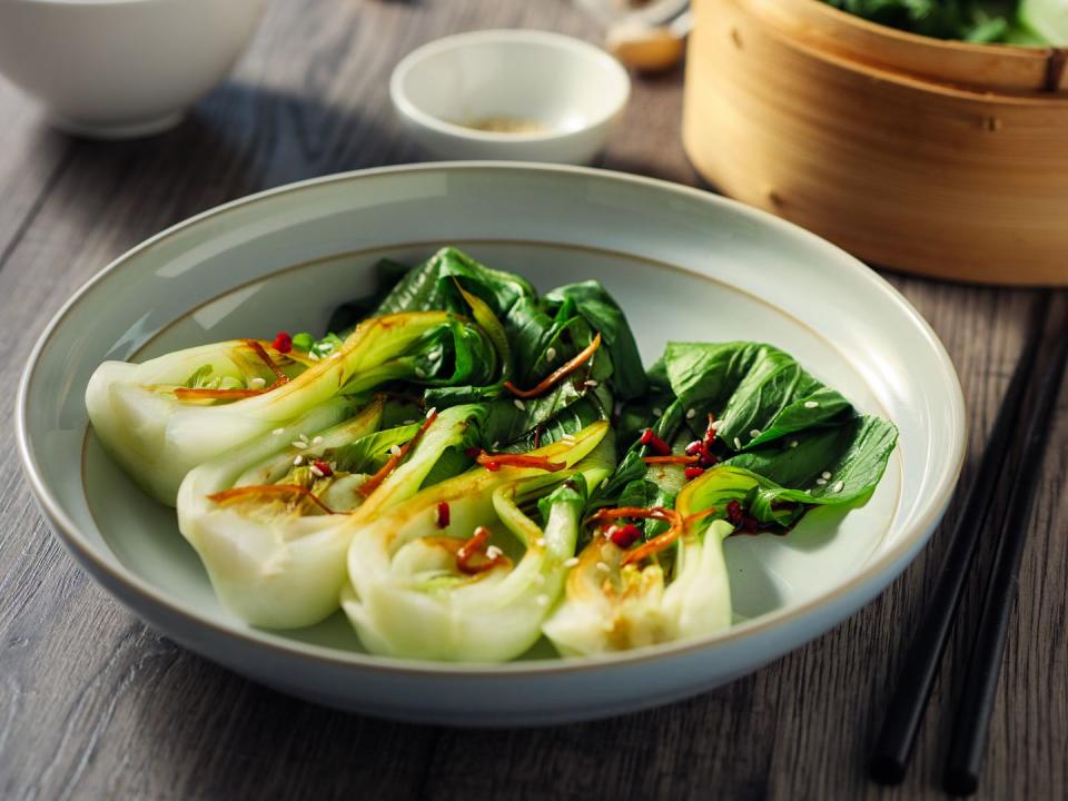 <p>This leafy green is technically a type of Chinese cabbage, mild in flavor with a tender yet crunchy center and vibrant, slightly bitter leaves. And besides being tasty, it’s also brimming with vitamins C and E and beta-carotene (all <a href="https://www.prevention.com/food-nutrition/healthy-eating/g23105176/anti-inflammatory-foods/" rel="nofollow noopener" target="_blank" data-ylk="slk:inflammation fighters;elm:context_link;itc:0;sec:content-canvas" class="link ">inflammation fighters</a>), as well as fiber, which supports good digestion and keeps you full, says Iu. </p><p>“A healthy and delicious way to prepare bok choy is to sauté it in a pan with garlic and ginger until just wilted. Drizzle with sesame oil and soy sauce,” Iu suggests.</p>