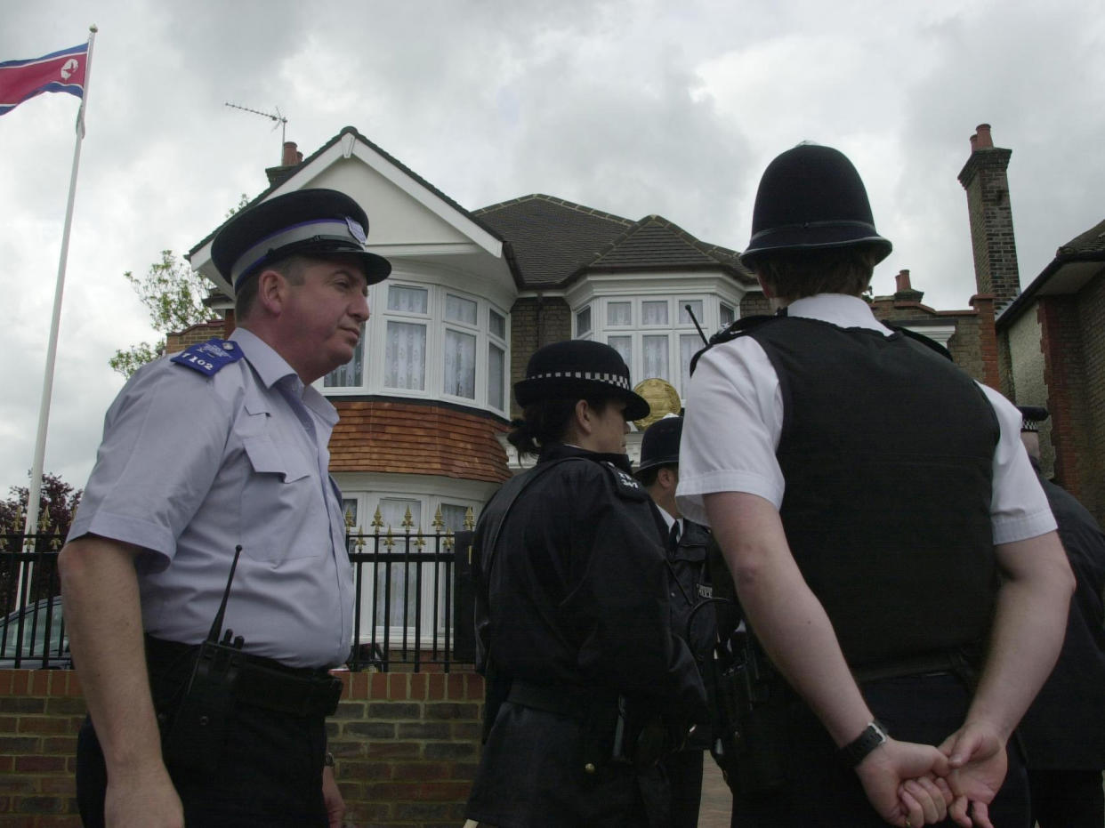 File photo: Police stand outside the North Korean embassy in Ealing on the day it was opened in 2003: PA Archive/PA Images