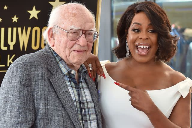 <p>Axelle/Bauer-Griffin/FilmMagic</p> Niecy Nash with Ed Asner at the Hollywood Walk of Fame