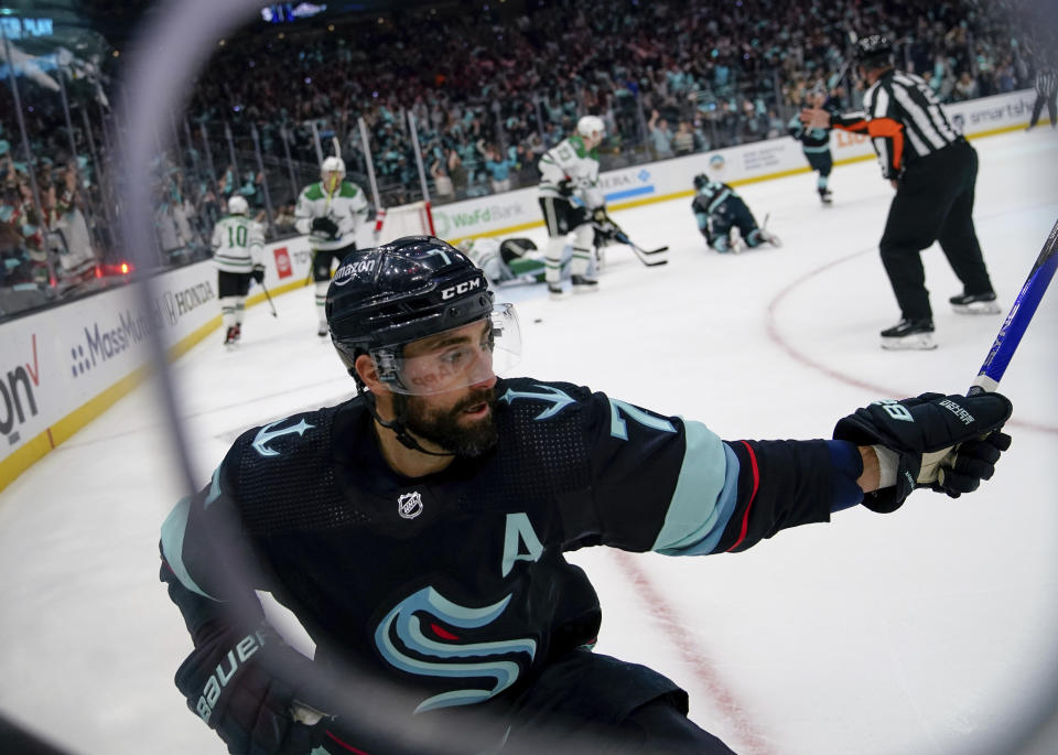 Seattle Kraken right wing Jordan Eberle celebrates his goal against the Dallas Stars during the first period of Game 6 of an NHL hockey Stanley Cup second-round playoff series Saturday, May 13, 2023, in Seattle. (AP Photo/Lindsey Wasson)