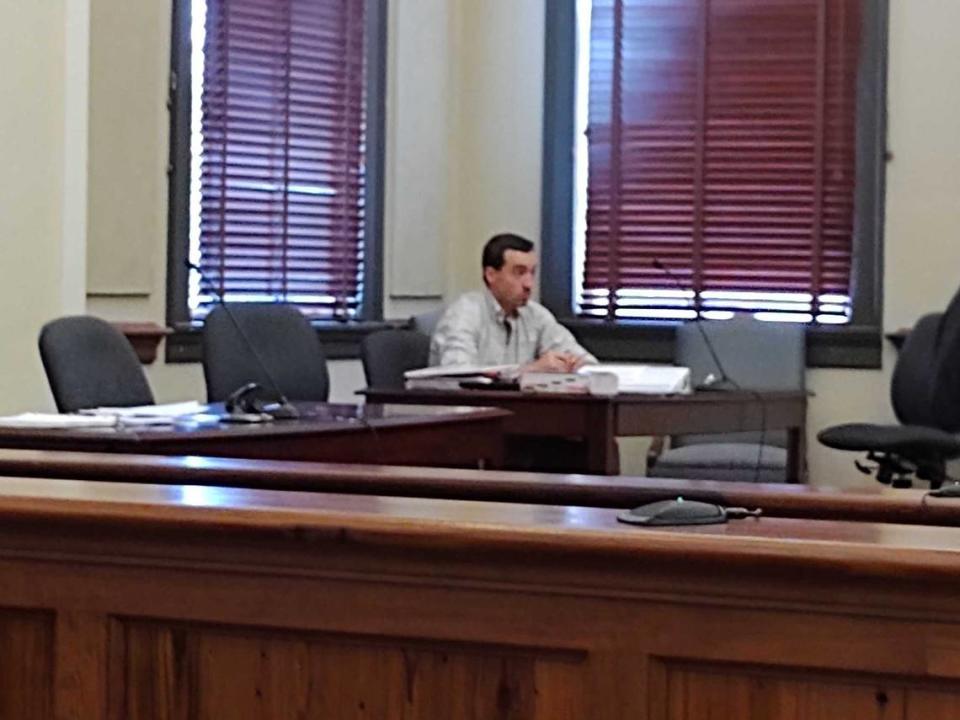 Former Diamondhead Councilman Alan Moran sits during a preliminary hearing during a felony child sex crimes case on April 15, 2022, at the Hancock County Courthouse in Bay St. Louis.