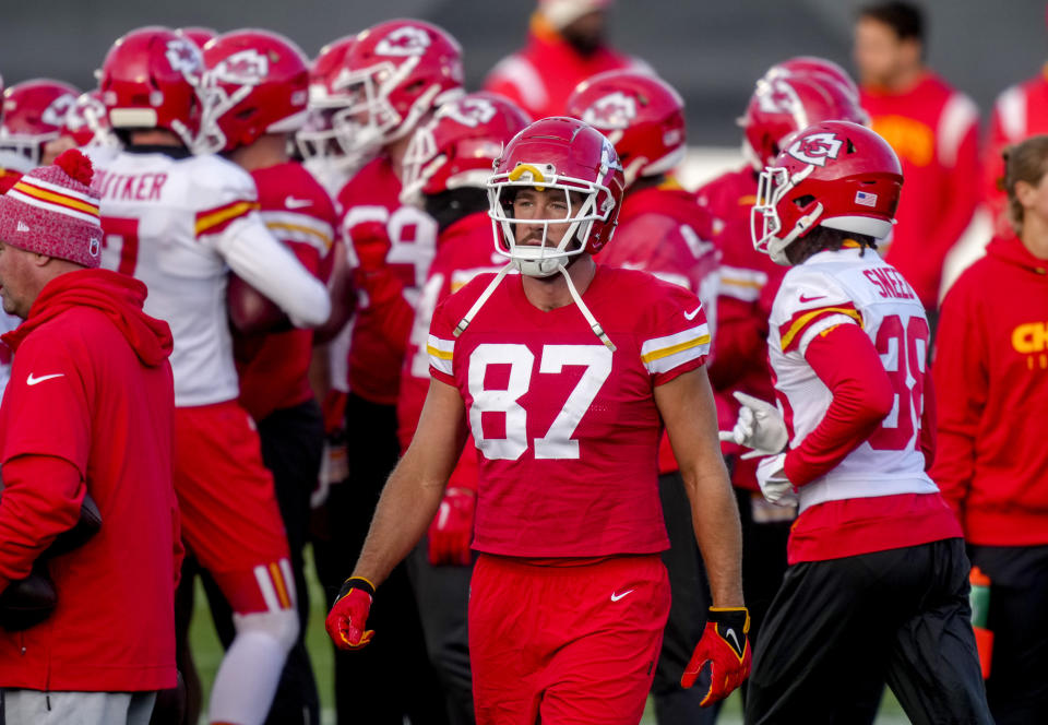 Kansas City Chiefs tight end Travis Kelce (87), centre, attends a practice session in Frankfurt, Germany, Friday, Nov. 3, 2023. The Kansas City Chiefs are set to play the Miami Dolphins in a NFL game in Frankfurt on Sunday Nov. 5, 2023. (AP Photo/Michael Probst)