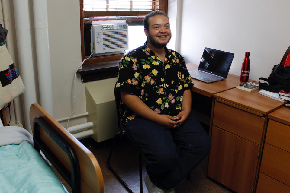 Angel Hope poses for a photo in his dorm room at the University of Wisconsin, in Madison, Wis., July 27, 2022. He was there for an intense six-week summer bridge program for students of color and first-generation students at the university. (AP Photo/Carrie Antlfinger)